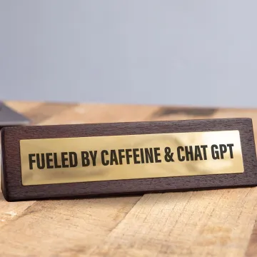 Wooden Desk Sign - Fuelled by Caffeine & Chat GPT